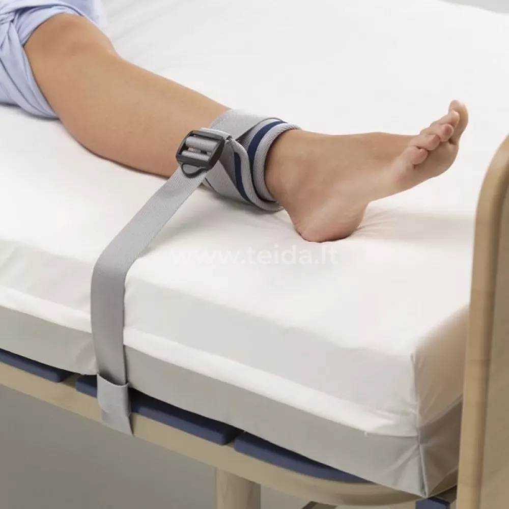 Čiurnos fiksavimo diržas prie lovos Čiurnos fiksavimo diržas prie lovos