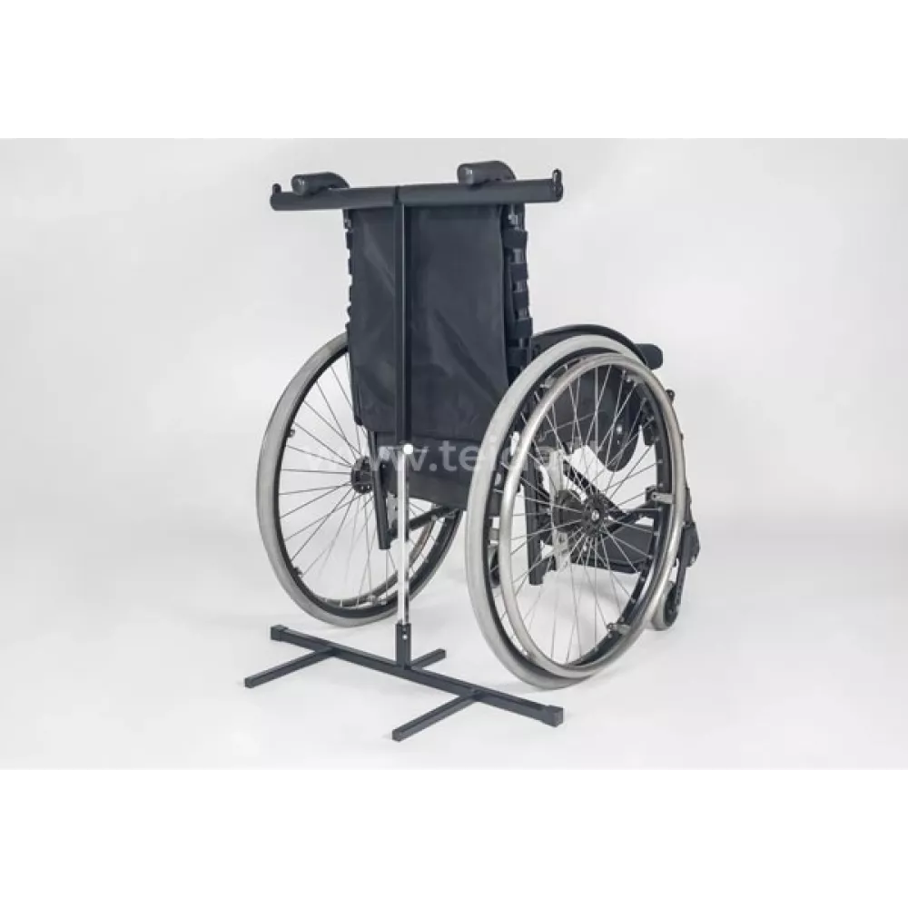 Priedas vaikiško neįgaliojo vežimėlio stabilizavimui